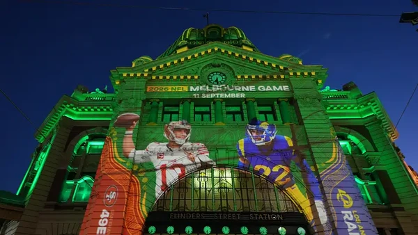 Melbourne, Victoria, Australia; Images of San Francisco 49ers quarterback Brock Purdy (13) and Los Angeles Rams cornerback Trent McDuffie (22) are projected onto the Flinders Street railway station 