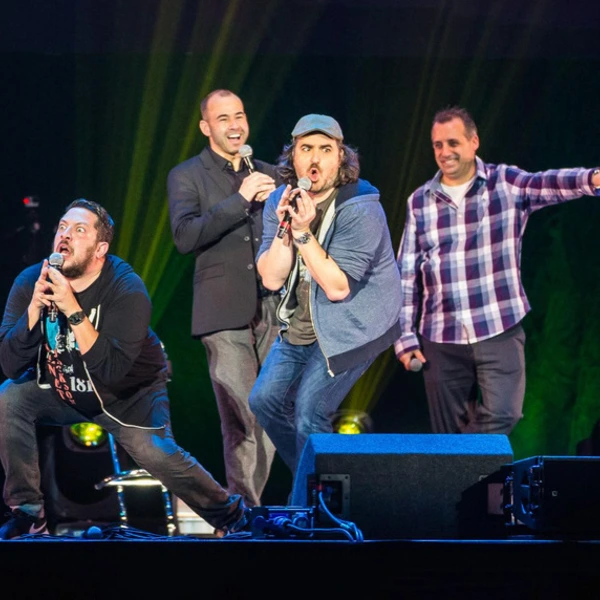 Impractical Jokers on stage performing