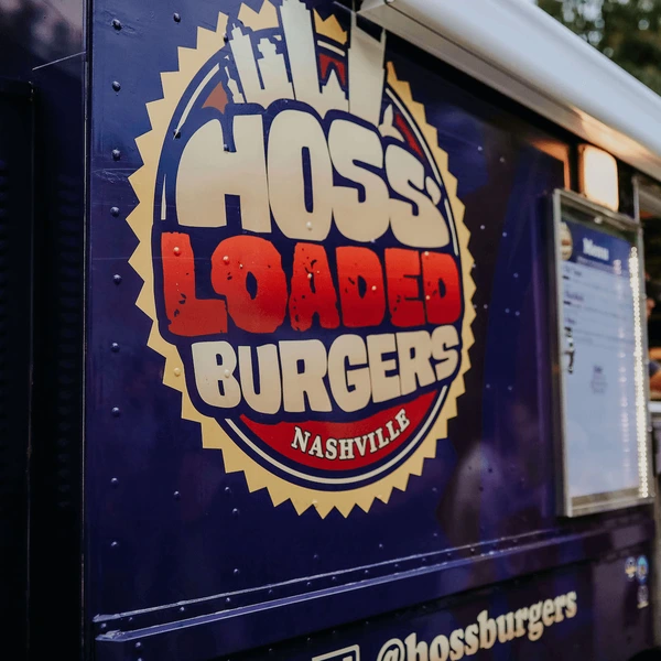 Hossburgers food truck serving customers