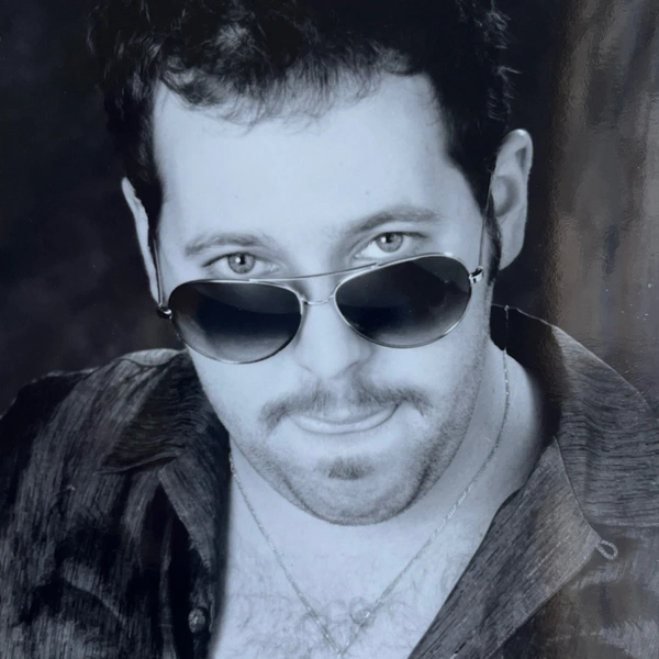 scanned photo of a younger Bert Kreischer