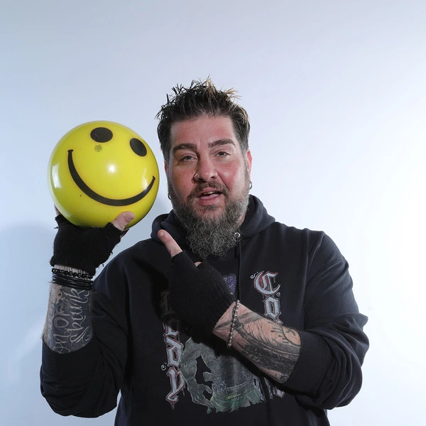Big Jay Oakerson with a smiley bowling ball